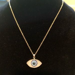 Gold and eye necklace